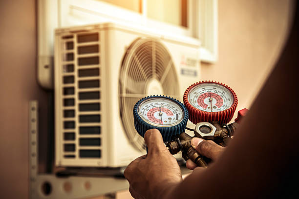 Professional Air Conditioning Service technician working in Lanark Village, FL